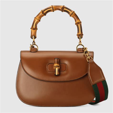 gucci bamboo bag price|gucci bag with bamboo handle.